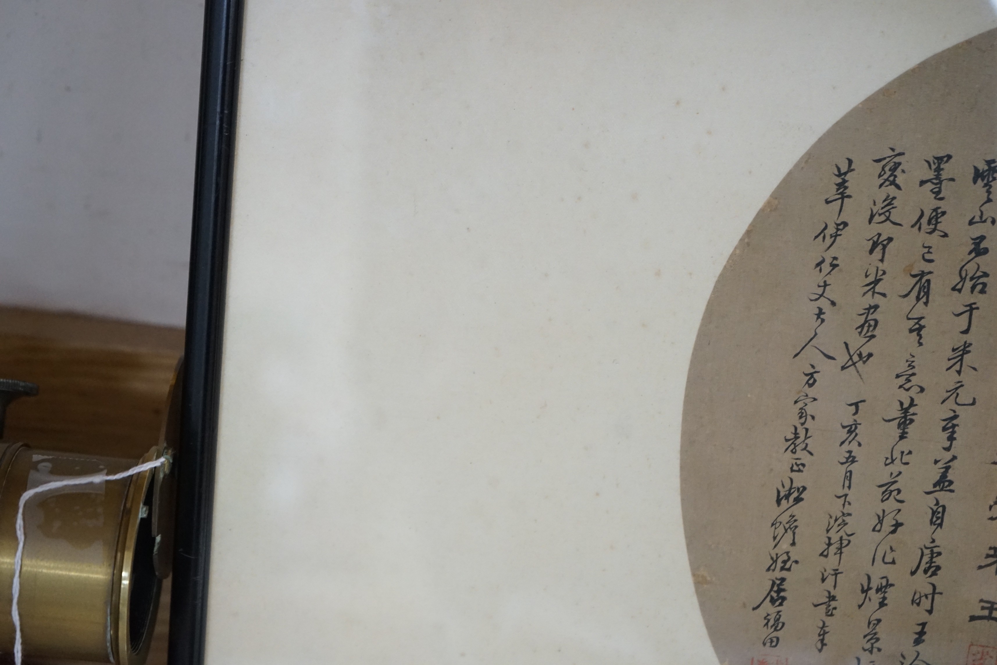 Two 19th century Chinese inscribed fan leaves, 24.5cms diameter